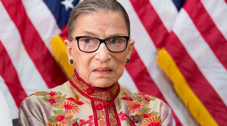 WASHINGTON, DC - MARCH 18: U.S. Supreme Court Justice Ruth Bader Ginsburg participates in an annual Women's History Month reception hosted by Pelosi in the U.S. capitol building on Capitol Hill in Washington, D.C. This year's event honored the women Justices of the U.S. Supreme Court: Associate Justices Ruth Bader Ginsburg, Sonia Sotomayor, and Elena Kagan. (Photo by Allison Shelley/Getty Images)