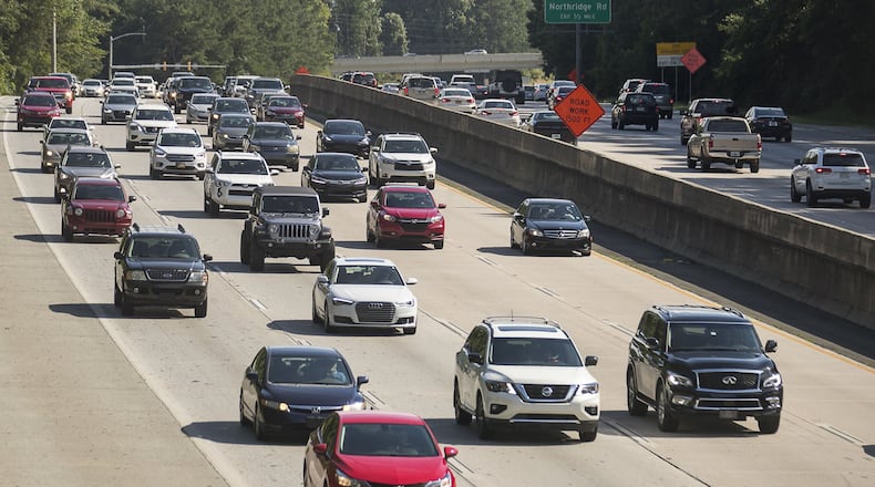 Automobiles travel along Georgia 400, Tuesday, July 23, 2019. Cities along Ga. 400 are talking about petitioning the Georgia Department of Transporation to have a say in how the new highway is being designed as part of the ongoing project.