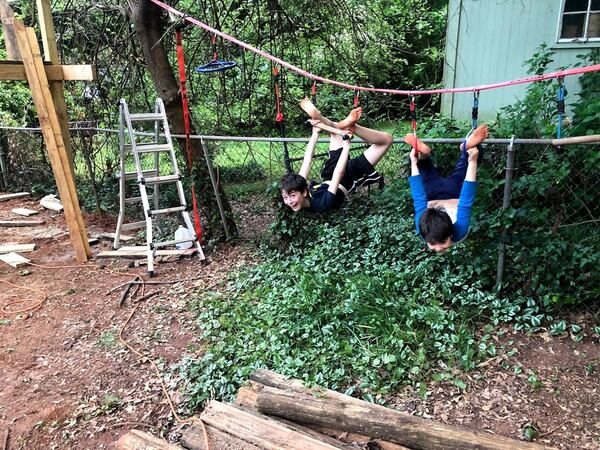 It’s not all hard work. Theodore (L) and James Mulford enjoy a fun moment in Fort Fun. Contributed by Douglas Mulford