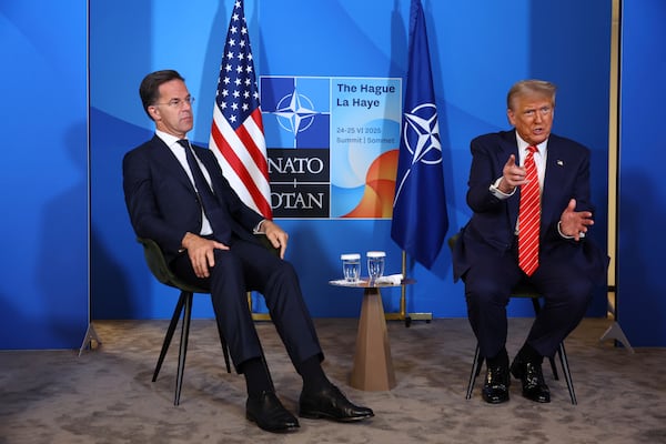 President Donald Trump, right, speaks during a meeting with NATO Secretary General Mark Rutte as he arrives for a NATO summit in The Hague, Netherlands, Wednesday, June 25, 2025. (Piroschka van de Wouw, Pool Photo via AP)