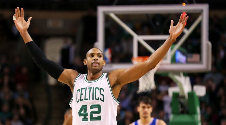 Al Horford of the Boston Celtics reacts during the third quarter against the Philadelphia 76ers at TD Garden on January 6, 2017 in Boston, Massachusetts. The Celtics defeat the 76ers 110-106. (Photo by Maddie Meyer/Getty Images)