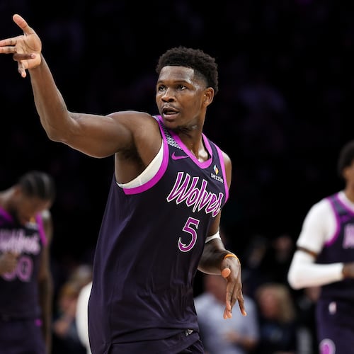 Minnesota Timberwolves guard Anthony Edwards celebrates his three-point basket against the Oklahoma City Thunder during the second half of an NBA basketball game Friday, Dec. 19, 2025, in Minneapolis. (AP Photo/Matt Krohn)