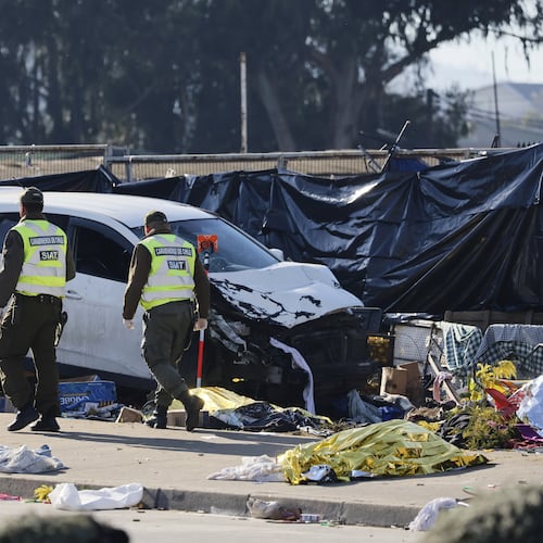 Police inspect a car after it struck a crowd at an open-air market in Vina del Mar, Chile, Sunday, July 12, 2026. (Sebastian Cisterna/ATON via AP)