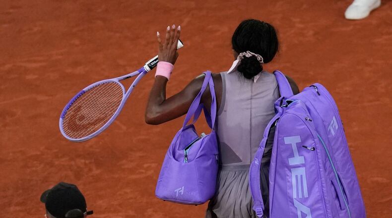 Coco Gauff of the U.S. leaves the court after the third round women's singles tennis match against Anastasia Potapova of Austria at the French Open tennis tournament in Paris, Saturday, May 30, 2026. (AP Photo/Christophe Ena)