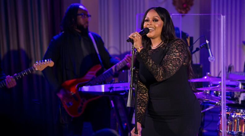 WASHINGTON, DC - AUGUST 02: Chrisette Michele performs a song for President Obama, first lady Michelle Obama, Prime Minister Lee Hsien Loong, Madam Ho Ching at the White House on August 2, 2016 in Washington, DC. The Obamas are hosting the prime minister and his wife for an official state dinner. (Photo by Leigh Vogel-Pool/Getty Images)