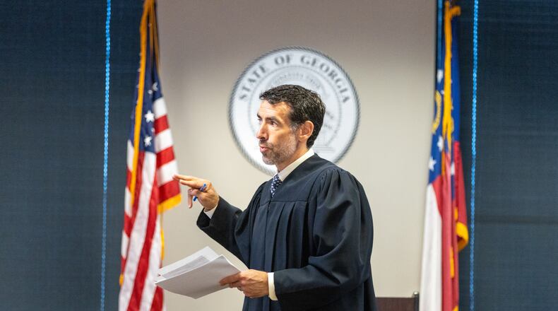 Judge Robert McBurney speaks to potential grand jurors in the Jury Assembly Room at Fulton County Courthouse in Atlanta on Tuesday, July 11, 2023. Two Fulton County grand juries are being selected, one of which will be expected to decide whether to hand up an indictment in the long-running investigation into alleged meddling with the 2020 presidential election. (Arvin Temkar / arvin.temkar@ajc.com)
