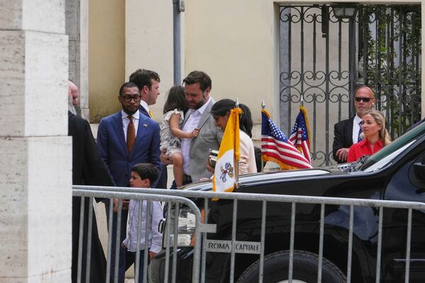 U.S. Vice President JD Vance, centre, his wife Usha and their children arrive at the Basilica of Saint Paul Outside The Walls in Rome, Sunday, April 20, 2025. (AP Photo/Alessandra Tarantino)