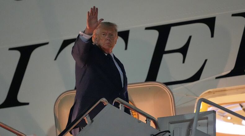 President Donald Trump waves as he boards Air Force One, Monday, July 6, 2026, at Joint Base Andrews, Md. (AP Photo/Alex Brandon)