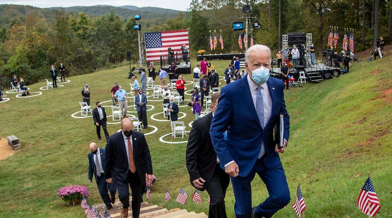 President-elect Joe Biden is followed by Secret Service Agents as he leaves a rally at Mountain Top Inn & Resort in Warm Springs, Tuesday, October 27, 2020. MANDATORY CREDIT: ALYSSA POINTER / THE ATLANTA JOURNAL-CONSTITUTION