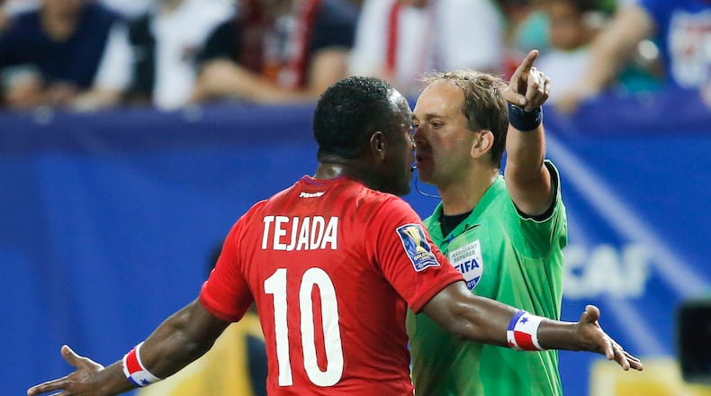 Panama's Luis Tejada (10) argues with an official during the first half against Mexico in a CONCACAF Gold Cup soccer semifinal, Wednesday, July 22, 2015, in Atlanta. (AP Photo/John Bazemore)