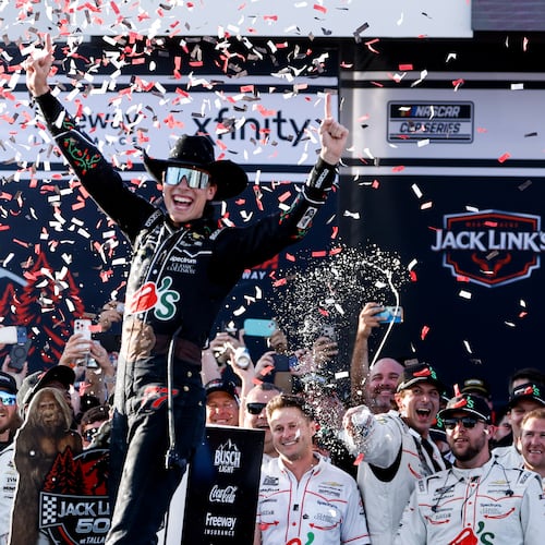 Carson Hocevar celebrates after winning a NASCAR Cup Series auto race, Sunday, April 26, 2026, in Talladega, Ala. (AP Photo/Butch Dill)
