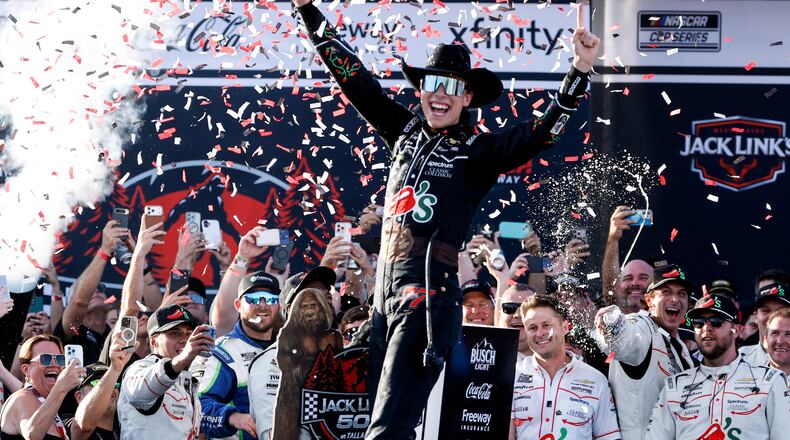 Carson Hocevar celebrates after winning a NASCAR Cup Series auto race, Sunday, April 26, 2026, in Talladega, Ala. (AP Photo/Butch Dill)