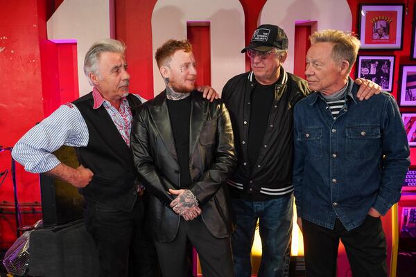 Glen Matlock, from left, Frank Carter, Steve Jones and Paul Cook of the Sex Pistols, pose for portrait photographs, in London, Friday, March 21, 2025. (Photo by Alberto Pezzali/Invision/AP)
