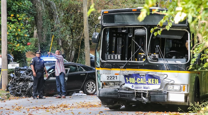 A car was traveling west on Campbellton Road when it veered into the east lane and hit a MARTA bus. JOHN SPINK / JSPINK@AJC.COM