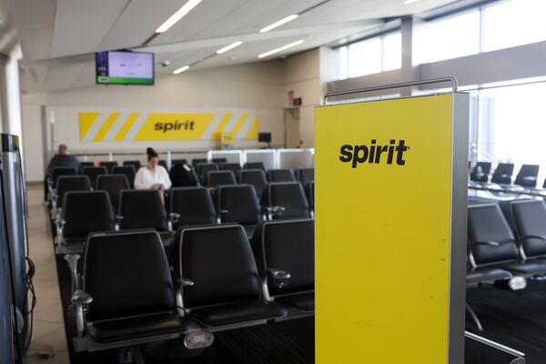A vacant Spirit Airlines gate is shown on Concourse C at Hartsfield-Jackson Atlanta International Airport, Tuesday, May 5, 2026, in Atlanta. Spirit Airlines ceased all operations and announced on Saturday, May 2nd, that it has gone out of business after 34 years. (Jason Getz/AJC)