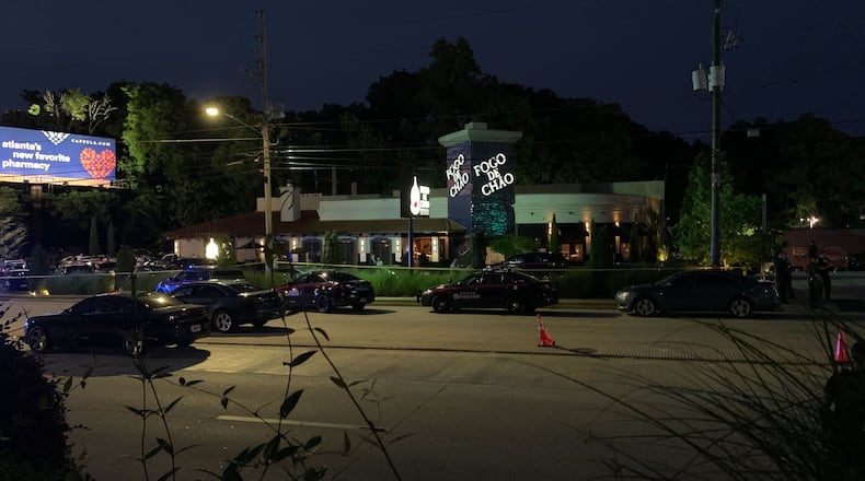 A man was fatally shot by an officer after he shot a security guard at Fogo de Chao, police said.