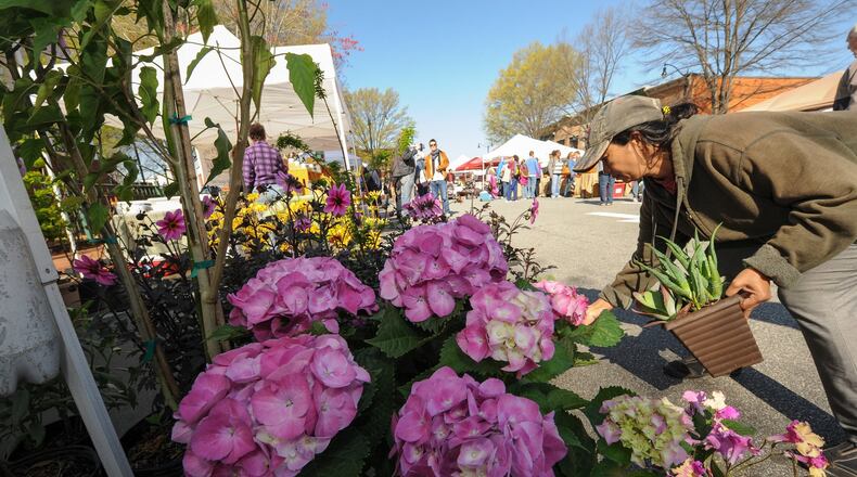 Marietta Square Farmers Market (shown last April) is open Saturdays all year and Sundays (noon-3 p.m.) in spring, summer and fall. CONTRIBUTED BY WWW.BECKYSTEIN.COM