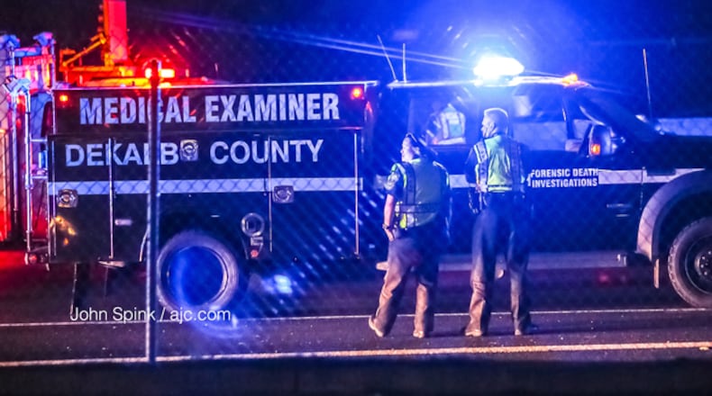 The DeKalb County Medical Examiner was called to the scene of a deadly accident on I-85 North near the North Druid Hills Road exit. JOHN SPINK / JSPINK@AJC.COM