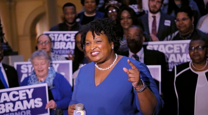 Democrat Stacey Abrams holds a news conference Tuesday to announce she has qualified to run for Georgia governor.