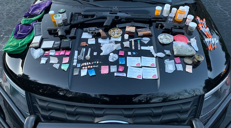 Marietta police discovered more than 100 pills and drugs such as heroin, fentanyl, crack cocaine and ketamine during a traffic stop Sunday on Franklin Gateway.