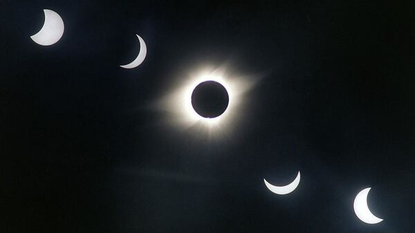 A multiple exposure photograph shows the progress of a solar eclipse over Xochicalco, Mexico in 1991. The sequence begins at the upper left.