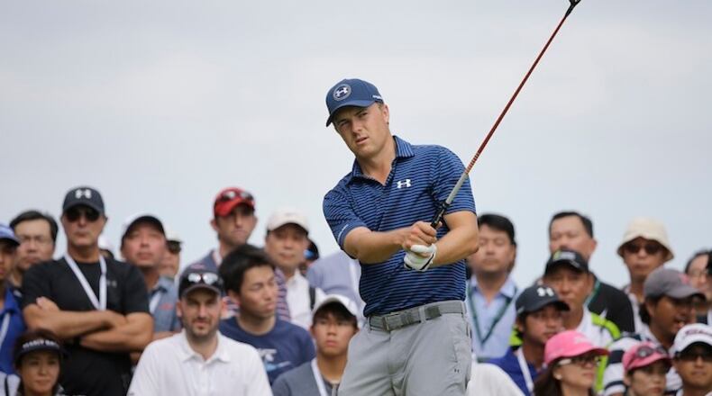 Jordan Spieth of the United States practices his swing on the third hole during the final round of the SMBC Singapore Open golf tournament at Sentosa Golf Club's Serapong Course on Sunday, Jan. 31, 2016, in Singapore. (AP Photo/Wong Maye-E)
