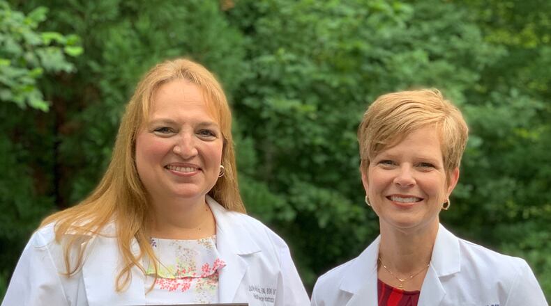 Teachers Julie McKenna and Laurie Davis led the effort to get state certification for Starr's Mill High School's healthcare education program. Courtesy FCBOE