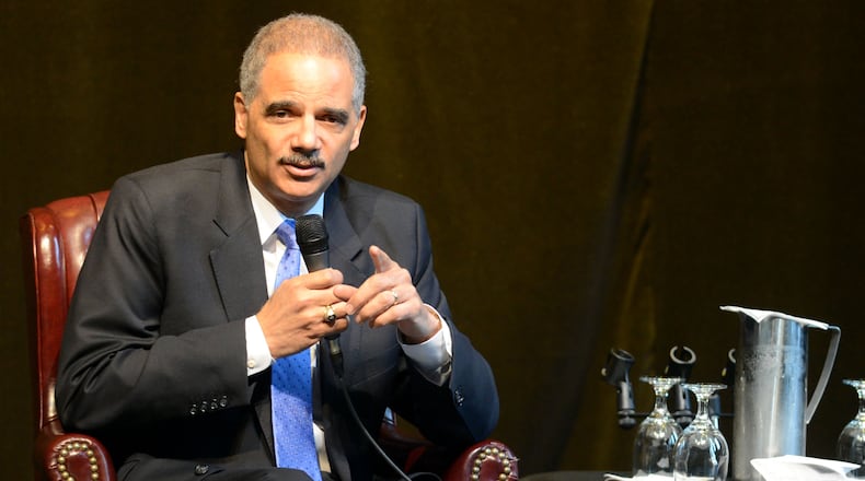 Then- U.S. Attorney General Eric Holder speaks during the Clark Atlanta Presidential Lecture series Thursday February 7, 2013. KENT D. JOHNSON / KDJOHNSON@AJC.COM