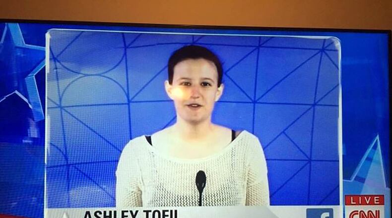 Georgia Tech student Ashley Tofil asks a question during the CNN debate.