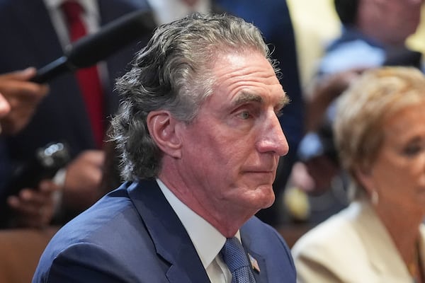 Secretary of Interior Doug Burgum listens to President Donald Trump speak during a cabinet meeting at the White House, Tuesday, July 8, 2025, in Washington. (AP Photo/Evan Vucci)