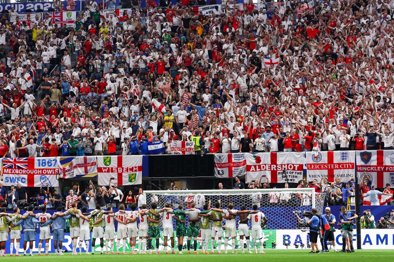 Fans stand and cheer for England after the team defeated Congo 2-1 during a World Cup match in the round of 32 at Atlanta Stadium on Wednesday, July 1, 2026, in Atlanta. (Jason Getz/AJC)