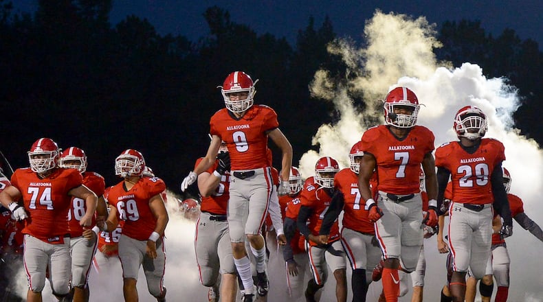 The Allatoona Buccaneers take the field before the start of their game against Hapeville Charter Friday, October 12, 2018 at Allatoona High School. PHOTO/Daniel Varnado