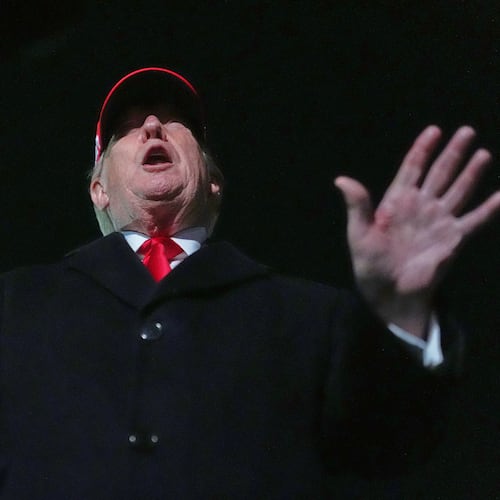 President Donald Trump speaks with reporters at Joint Base Andrews, Md., Sunday, April 12, 2026, after he returned from Miami. (AP Photo/Julia Demaree Nikhinson)