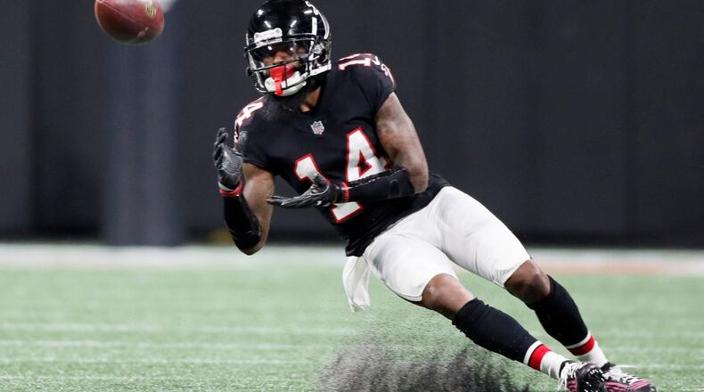 Atlanta Falcons wide receiver Justin Hardy (14) makes a catch for a first down against the New York Giants Monday, October 22, 2018, at Mercedes-Benz Stadium in Atlanta.