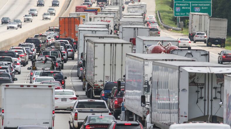 JOHN SPINK /JSPINK@AJC.COM