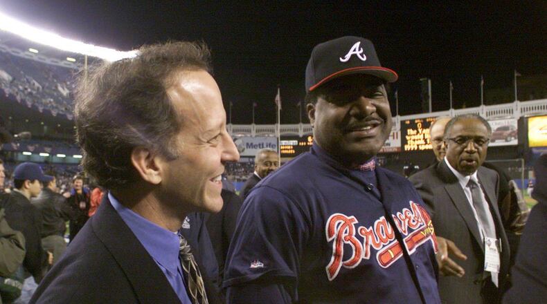 Braves batting coach Don Baylor and NBC announcer Jim Gray chat during the Braves' batting practice prior to Game Three of the World Series at Yankee Stadium on Oct. 26, 1999 in New York City. (PHOTO BY DAVID TULIS/STAFF)