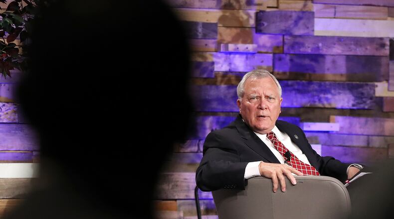 Gov. Nathan Deal takes a question from a member of the audience while discussing the Opportunity School District referendum at Impact Church on Tuesday in East Point. Curtis Compton /ccompton@ajc.com