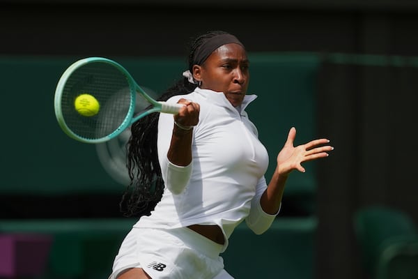 Coco Gauff of United States hits a return to Aryna Sabalenka of Belarus during a practice session ahead of the Wimbledon Championships in London, Friday, June 27, 2025. (AP Photo/Joanna Chan)
