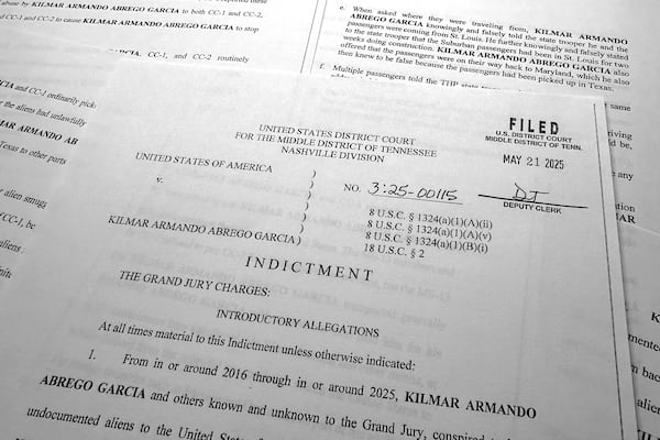 The indictment of Kilmar Abrego Garcia that charges him with transporting people who were in the United States illegally, is photographed, Friday, June 6, 2025, in Washington. (AP Photo/Jon Elswick)