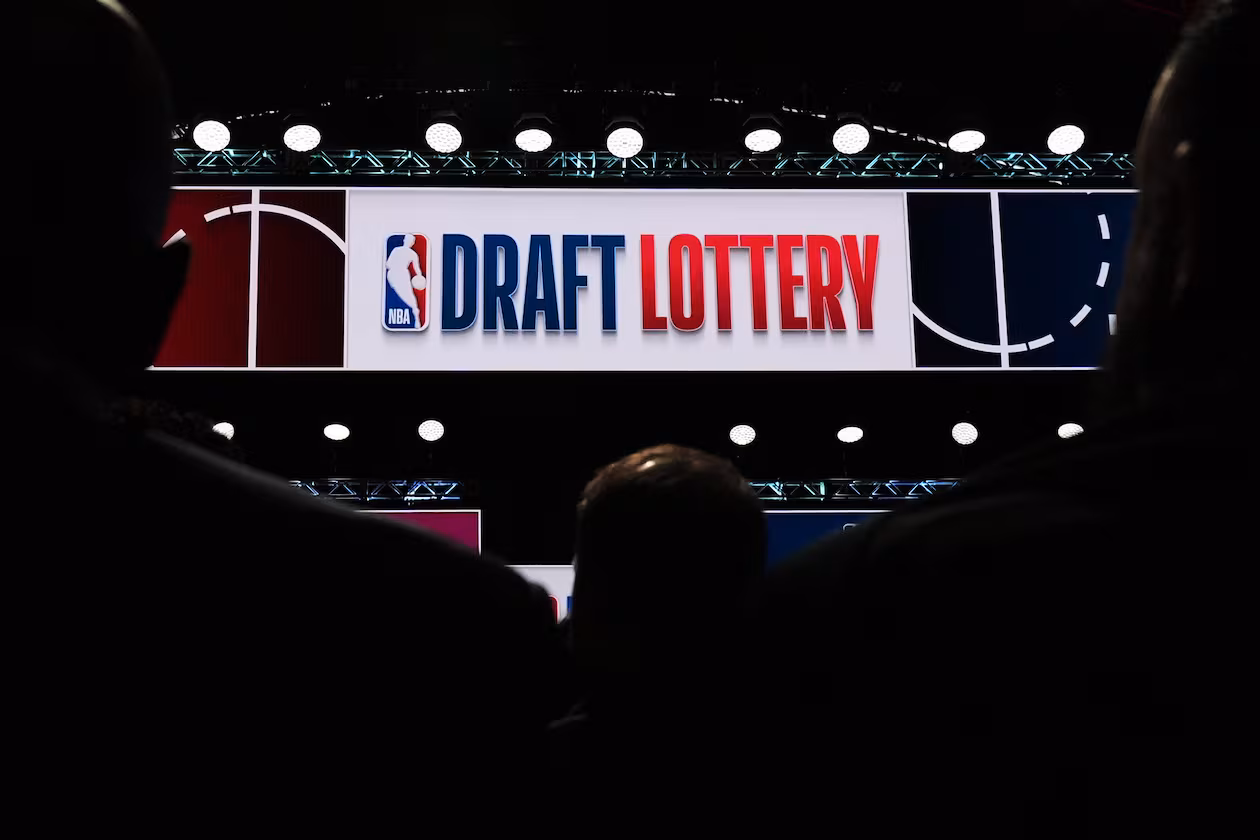 People attend the NBA basketball draft lottery in Chicago, Sunday, May 10, 2026. (AP Photo/Nam Y. Huh)