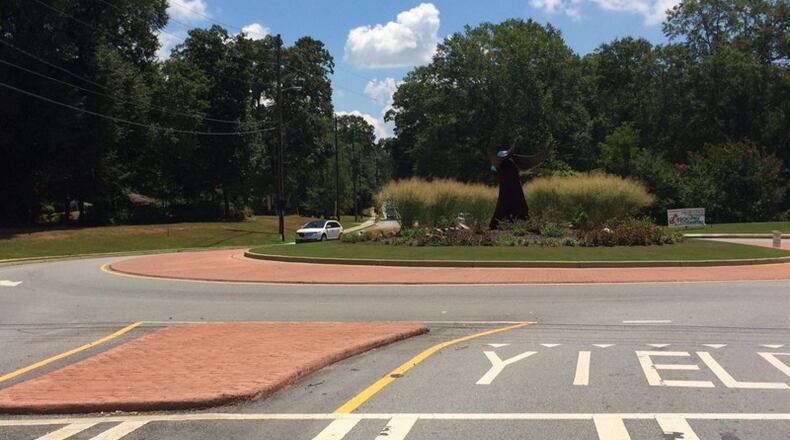 Cherokee County has voiced support of roundabouts in a possible future plan for the interchange ramps of I-575 at Howell Bridge Road in Ball Ground. AJC FILE