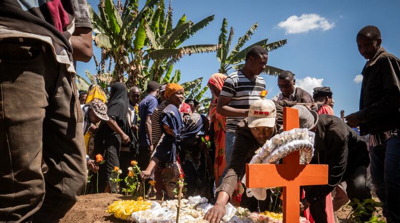 Mourners gather for the funeral of someone who died during post-electoral violence in Arusha, Tanzania, Tuesday, Nov. 4, 2025. (AP Photo)