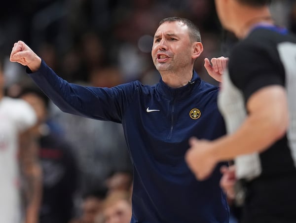 Denver Nuggets interim head coach David Adelman directs his team against the Oklahoma City Thunder in the second half of Game 6 in the Western Conference semifinals of the NBA basketball playoffs Thursday, May 15, 2025, in Denver. (AP Photo/David Zalubowski)