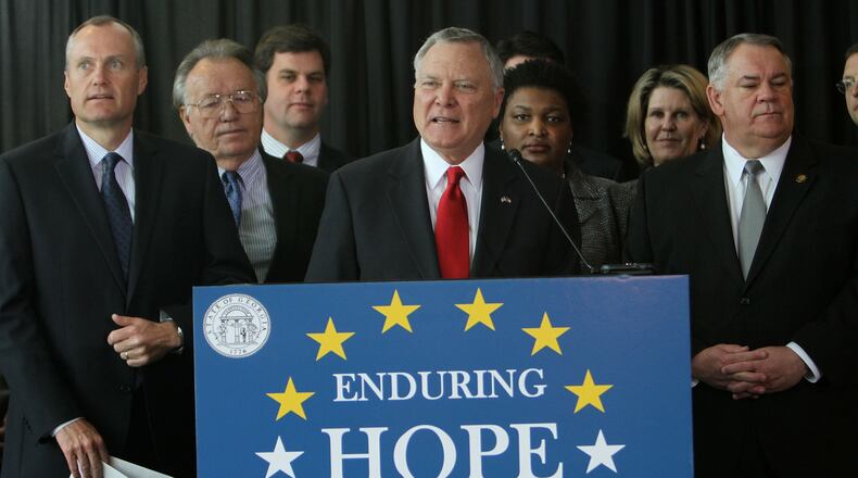 Georgia Gov. Nathan Deal and other lawmakers outline a sweeping overhaul of HOPE scholarship and prekindergarten programs to keep them from going broke during a press conference at the State Capitol on Feb. 22, 2011. AJC FILE PHOTO.