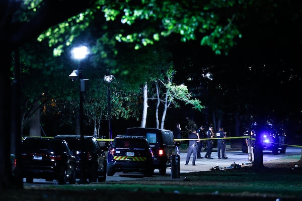 Atlanta police respond to a fatal shooting inside Piedmont Park late Saturday, April 4, 2026. (Arvin Temkar/AJC)