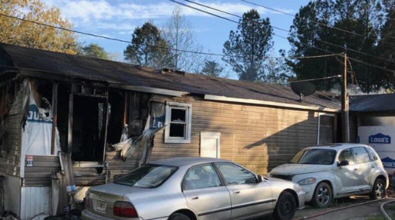 Four children and three adults were displaced after a fire damaged this Hall County mobile home Wednesday.