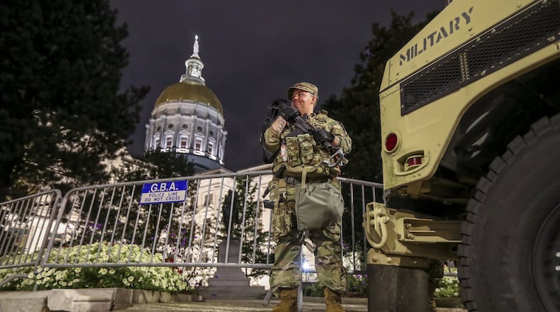 July 8, 2020 Atlanta: Specialist, O’Donnell was posted guard in front of the Georgia State Capitol building on Wednesday, July 8, 2020. JOHN SPINK/JSPINK@AJC.COM