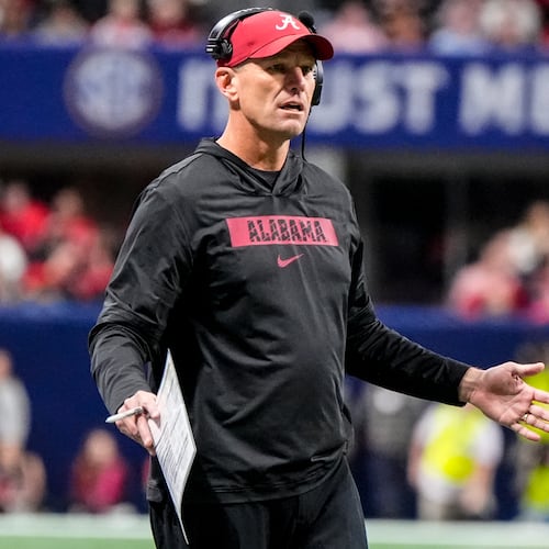 Alabama head coach Kalen Deboer speaks to an official during the first half of a Southeastern Conference championship NCAA college football game between Georgia and Alabama, Saturday, Dec. 6, 2025, in Atlanta. (AP Photo/Mike Stewart)