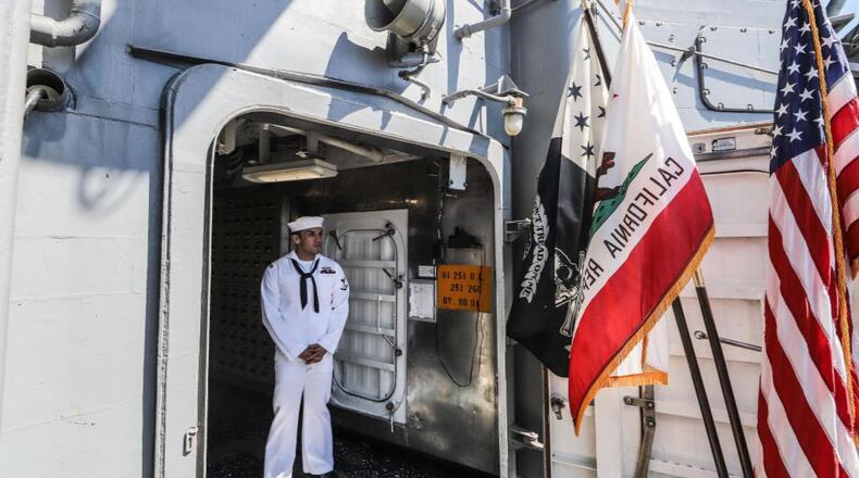 A U.S. Navy officer on duty onboard an aircraft carrier.  A metro Atlanta sailor and Morehouse College graduate, Lt. j.g. Asante McCalla, has been missing from the U.S.S. Lake Erie since Sunday morning. A search is underway.