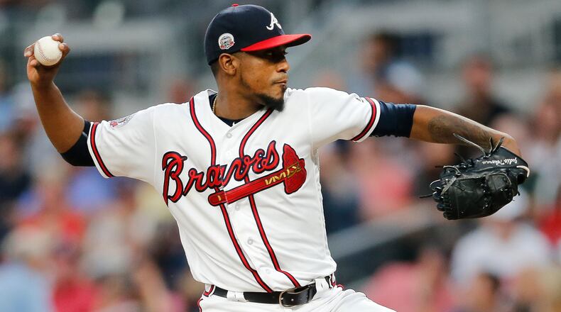 Atlanta Braves starting pitcher Julio Teheran (49) works against the Chicago Cubs during the first inning of a baseball game Monday, July 17, 2017, in Atlanta. (AP Photo/John Bazemore)